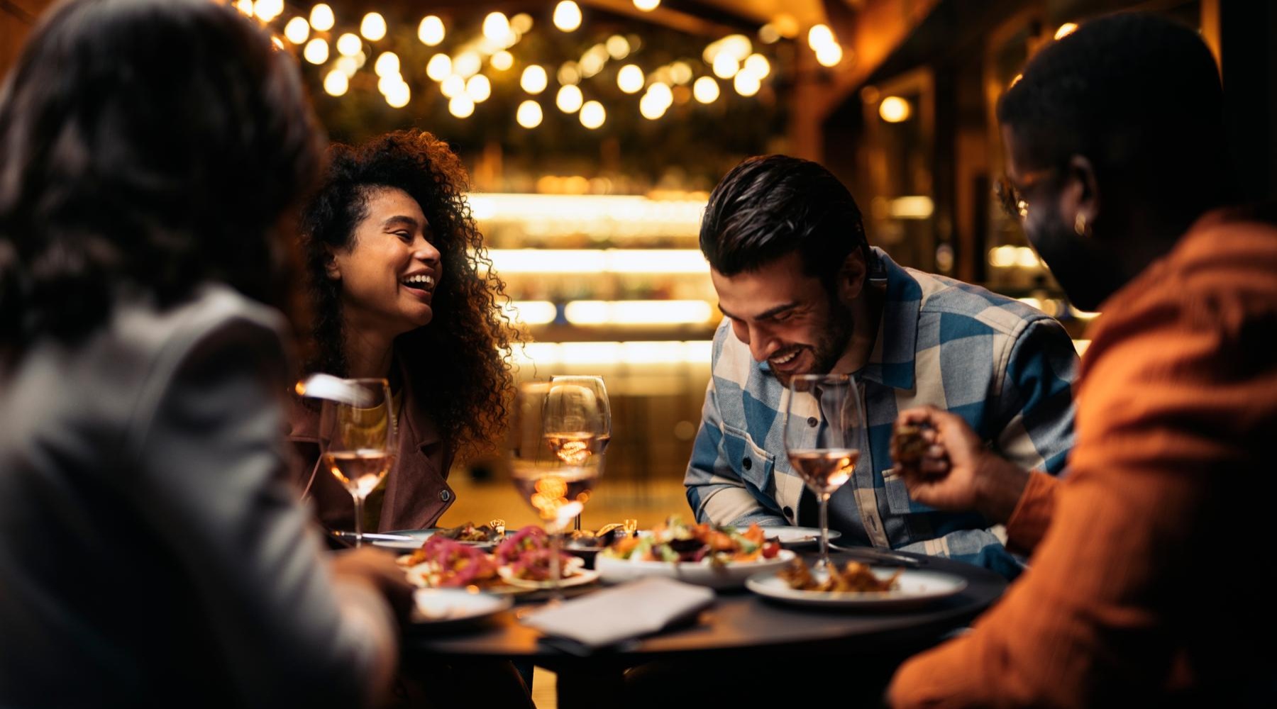 Group of people out enjoying a meal 